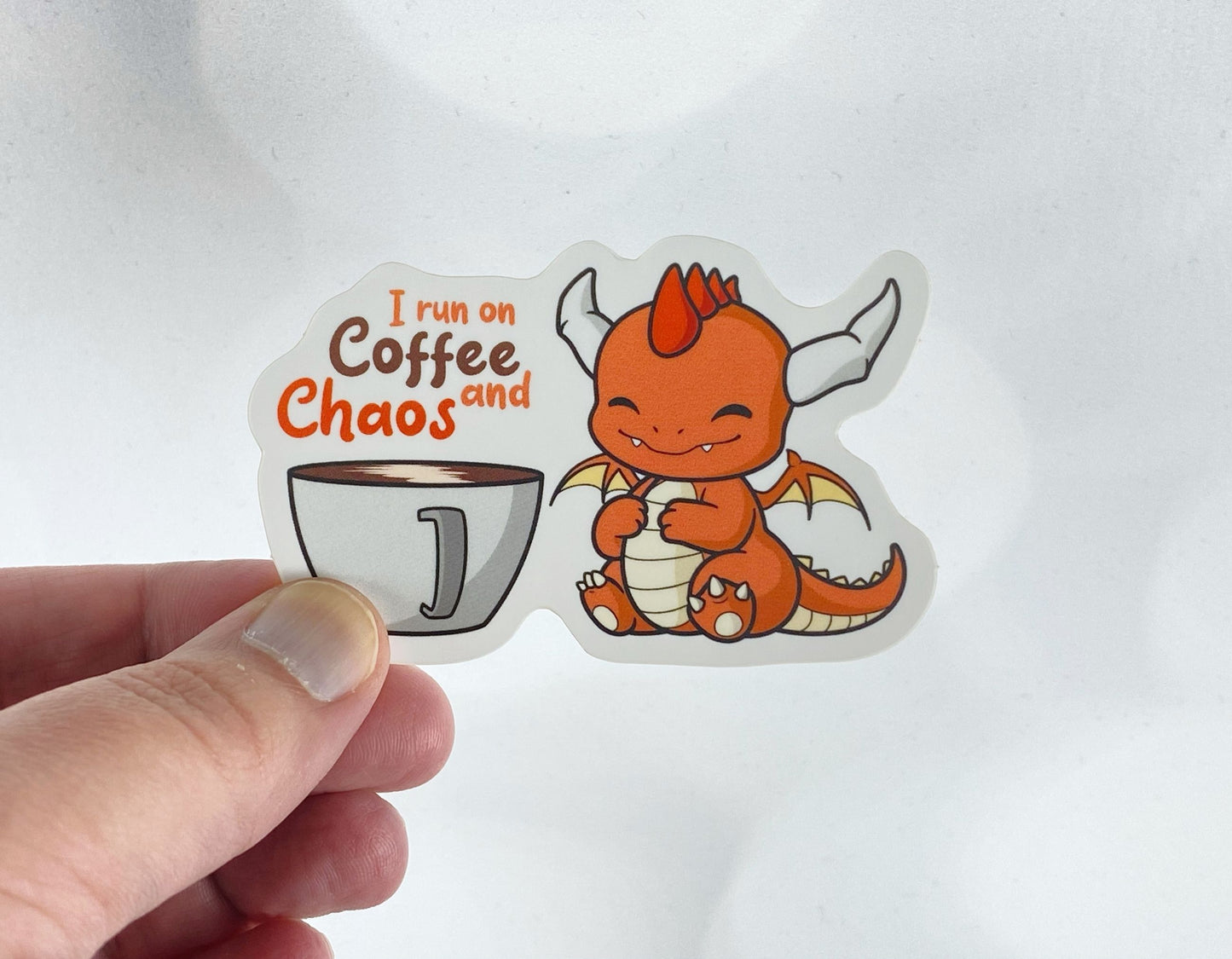 Fun Dragon Sticker: Fueled by Coffee and Chaos