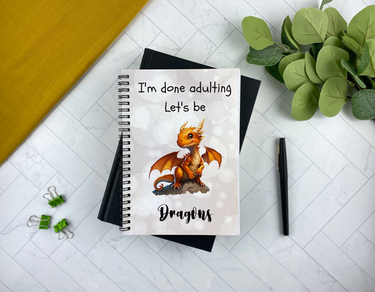 Fantasy-Themed Spiral Notebook with Cute Orange Dragon