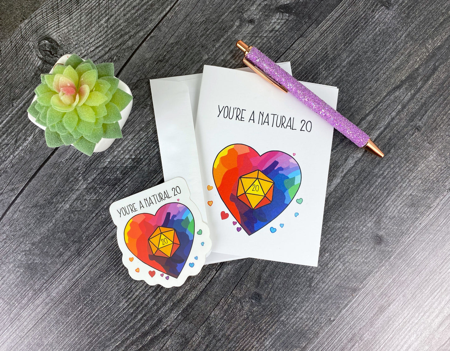 Positive Vibes TTRPG Sticker – Rainbow D20 Heart